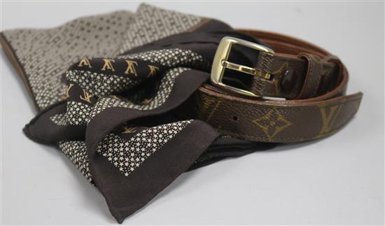 A Louis Vuitton ladies belt and silk scarf,